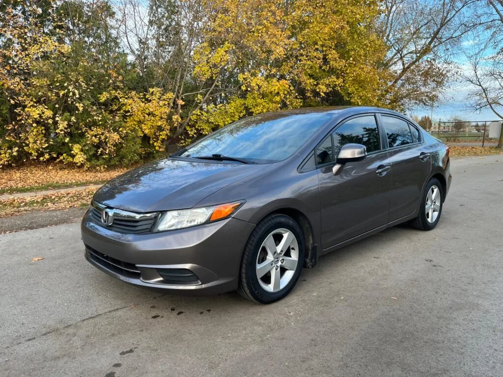 Used Honda Civic Touring for Sale ZAFFS Motors Beamsville, Ontario. Mint condition, low mileage safety certified, carfax report available, rust proofing.
